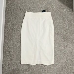 Marciano ivory white pencil skirt with a gold zipper on the back.